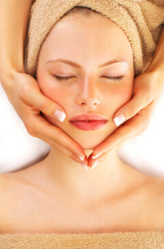 Portrait of a young girl enjoying a healthy skin treatment at a spa resort.
